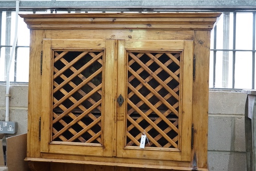 An 18th century and later French provincial pine dresser, width 114cm, depth 44cm, height 195cm